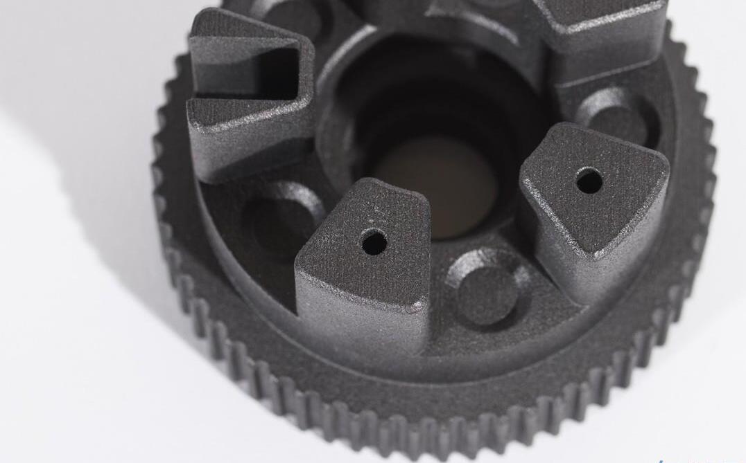 Dark nylon gear component with integrated structural and mounting features