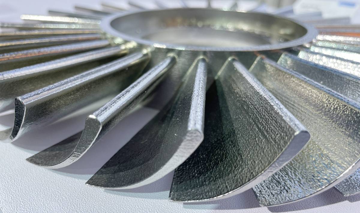 Close-up of a metal impeller from the CK 3D printing and CNC article