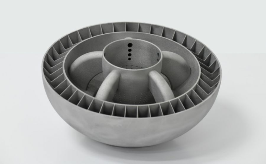 Metal component with curved vanes and an intricate internal structure