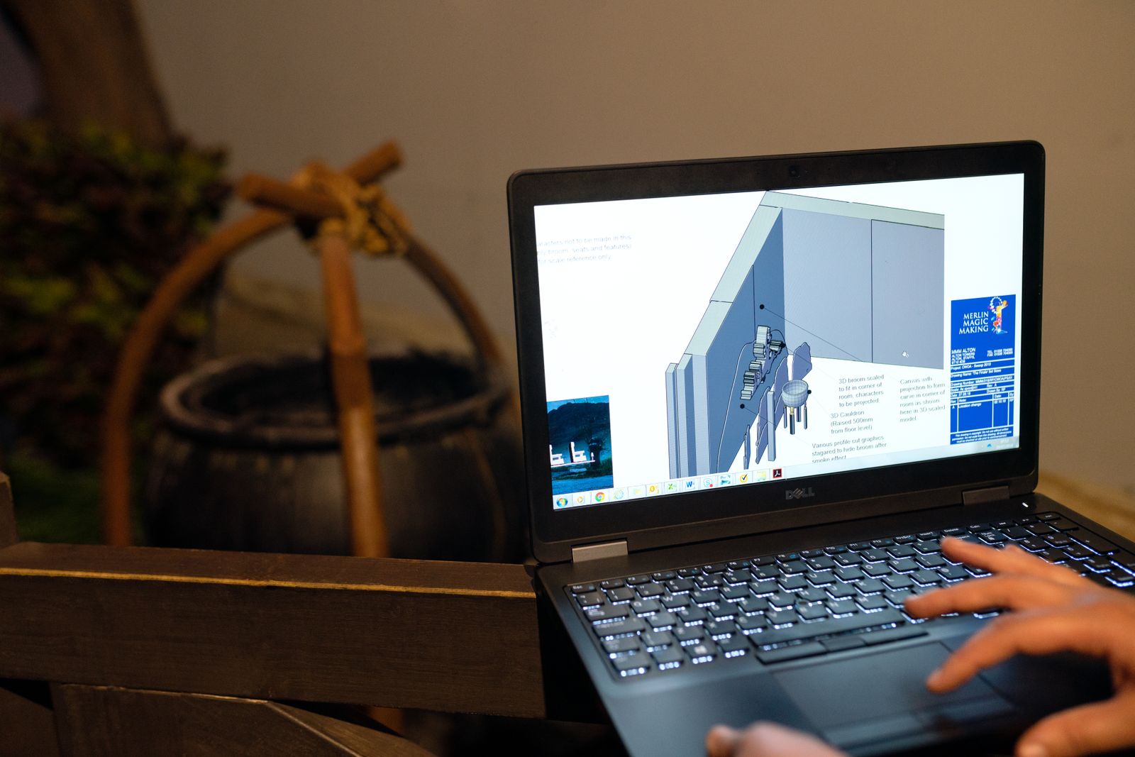 Engineer reviewing mechanical CAD on a laptop