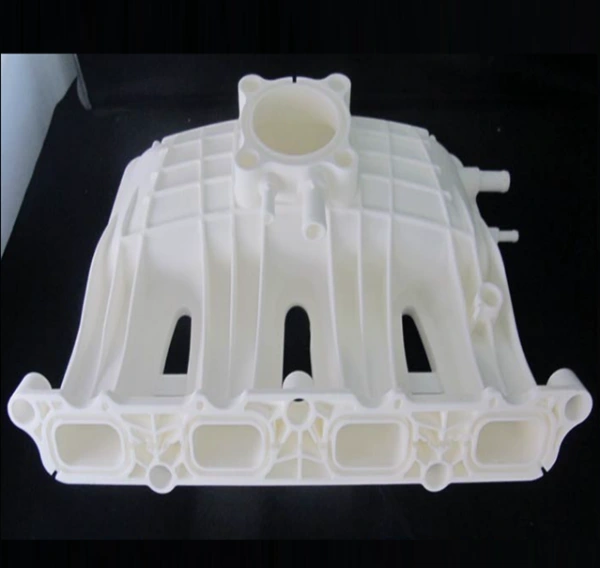 White 3D printed intake manifold prototype