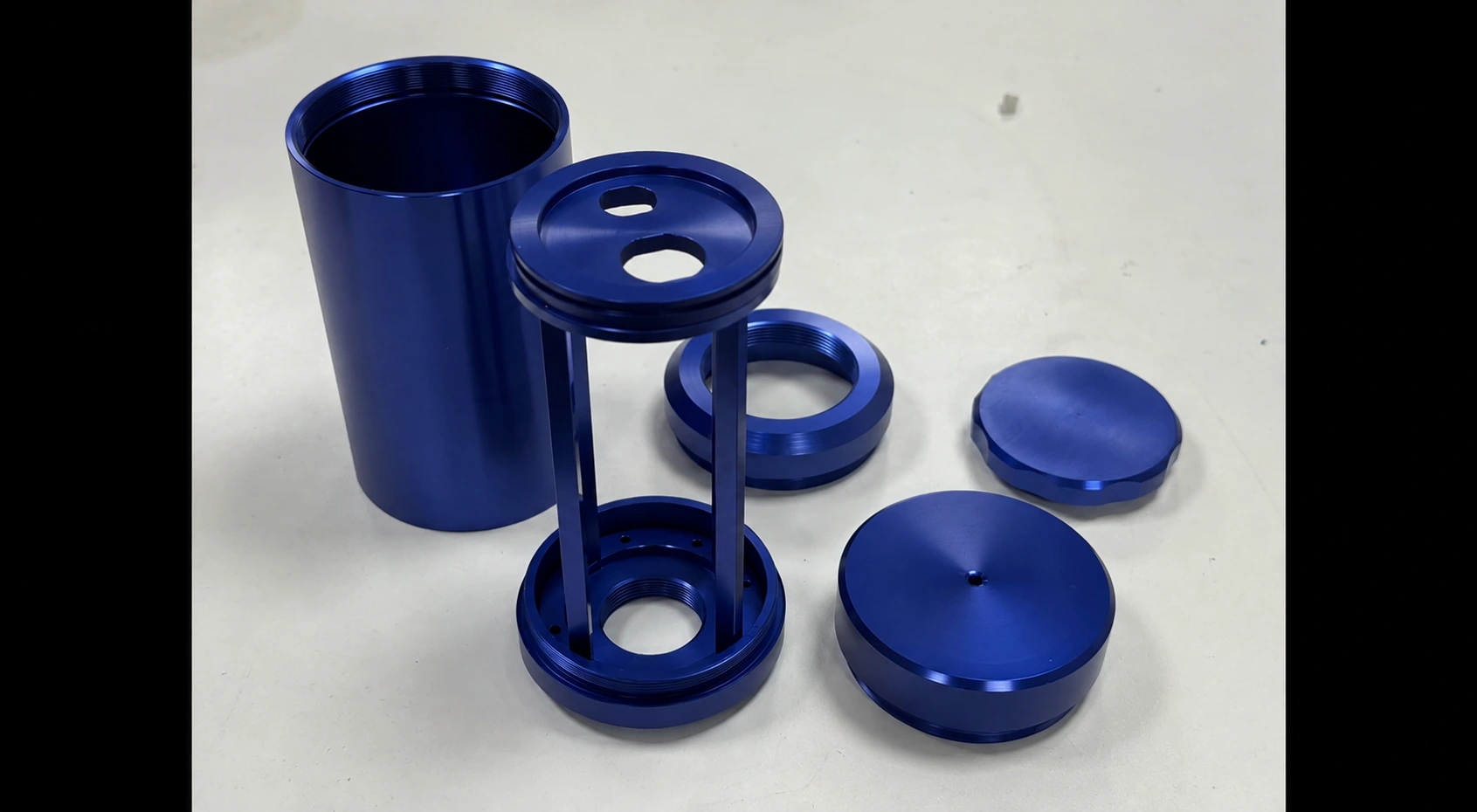 Blue finished machined components from CK's supplied video