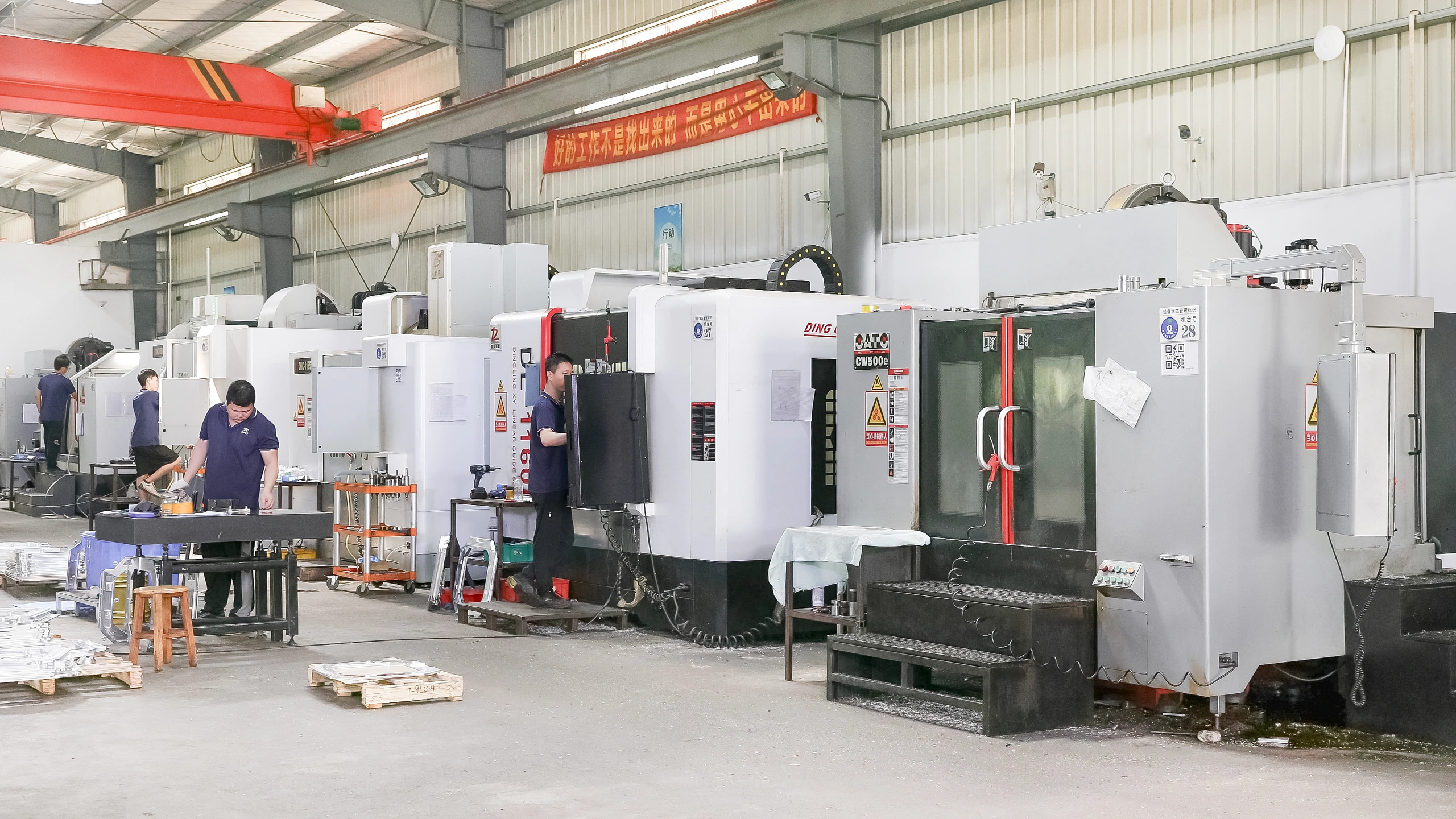 CK CNC machining cells with machines and staff