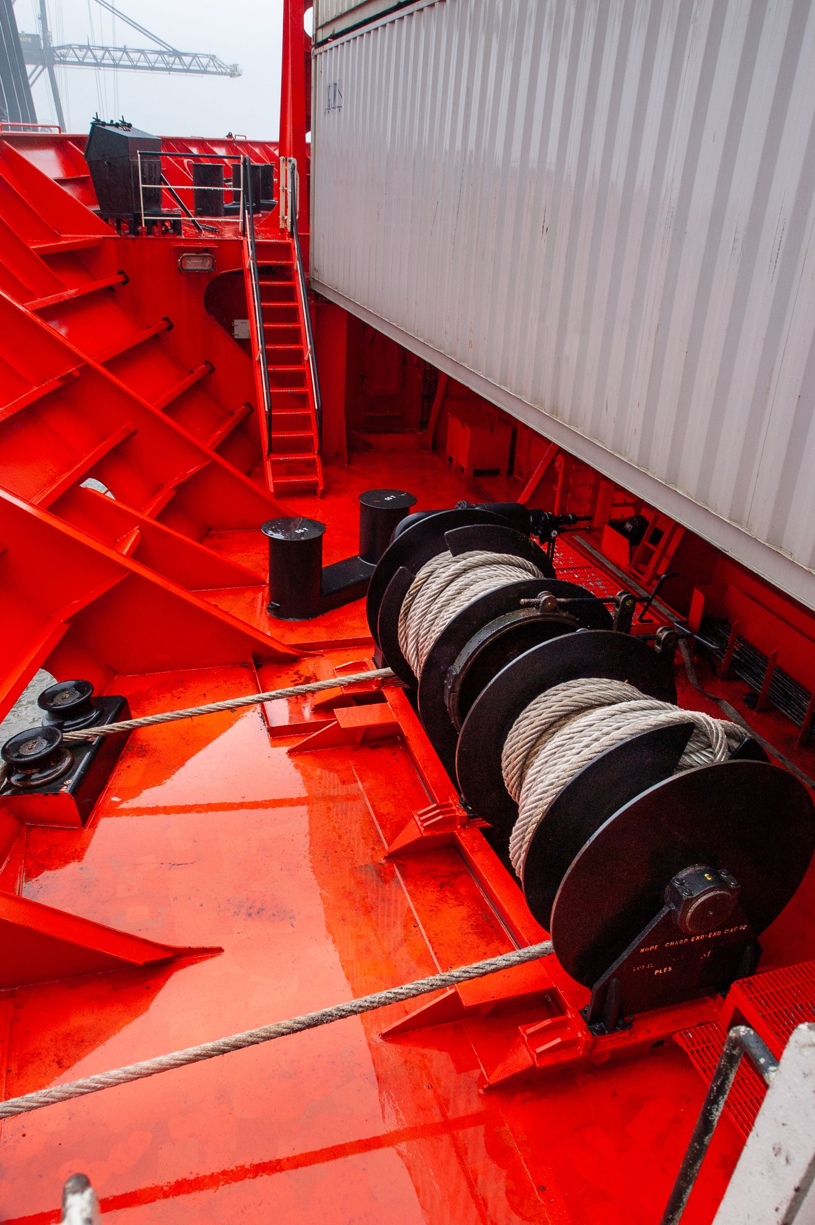 Mooring winch and handling equipment on a vessel deck